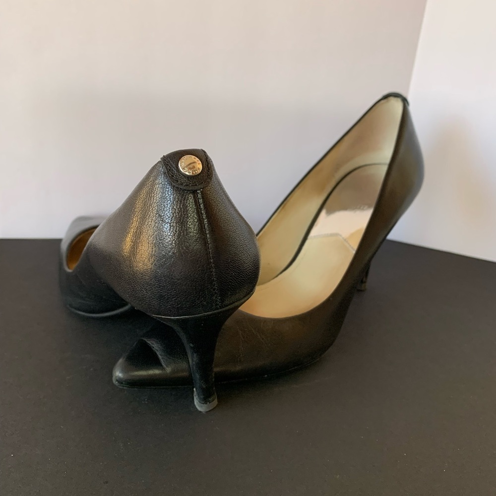 Women’s black leather Michael Kors heels size 10